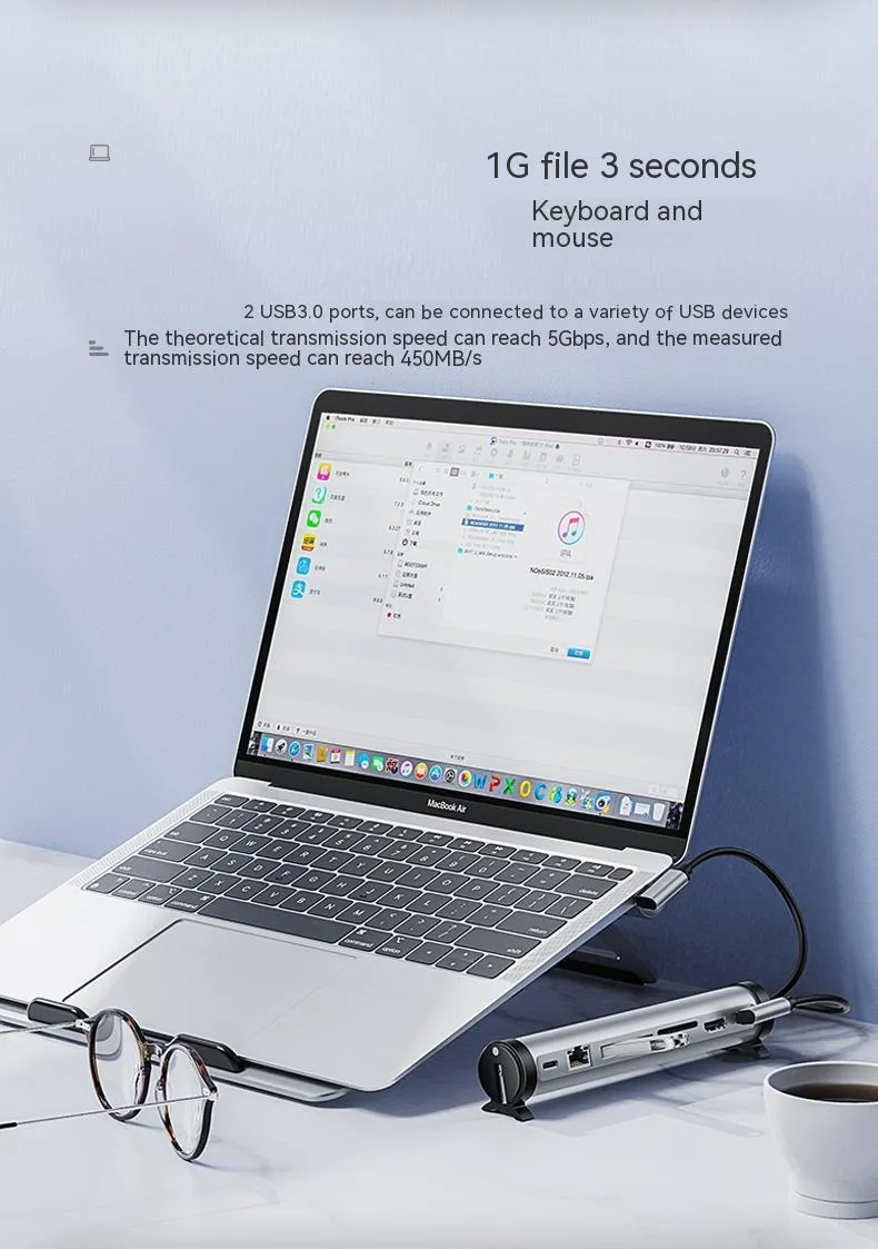 Aluminium alloy notebook docking station with multiple USB 3.0 ports and cable on desk