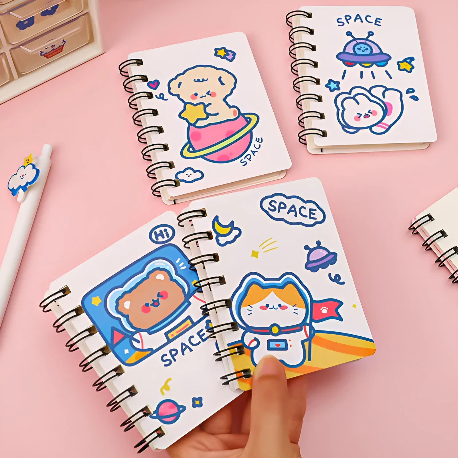 Astronaut series pocket flipper notebook showing 10.5cm x 8cm dimensions with choice of four cover designs