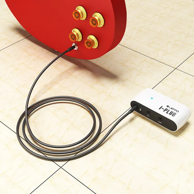 White metal distortion headphone amplifier with I PLUG design for electric guitar practice