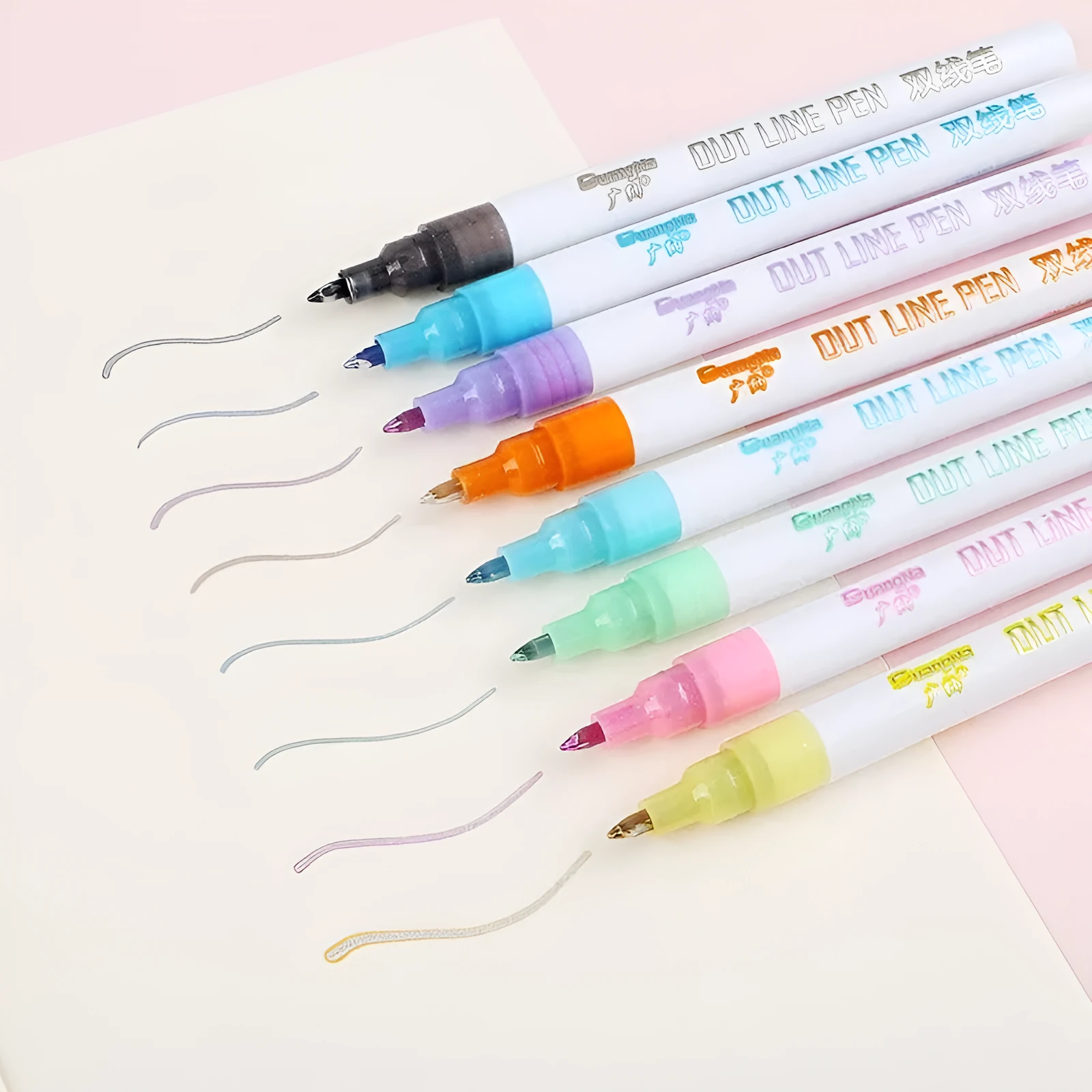 Set of colourful highlighter pens with plastic nibs and water-based ink, showing 1-2mm line width on paper