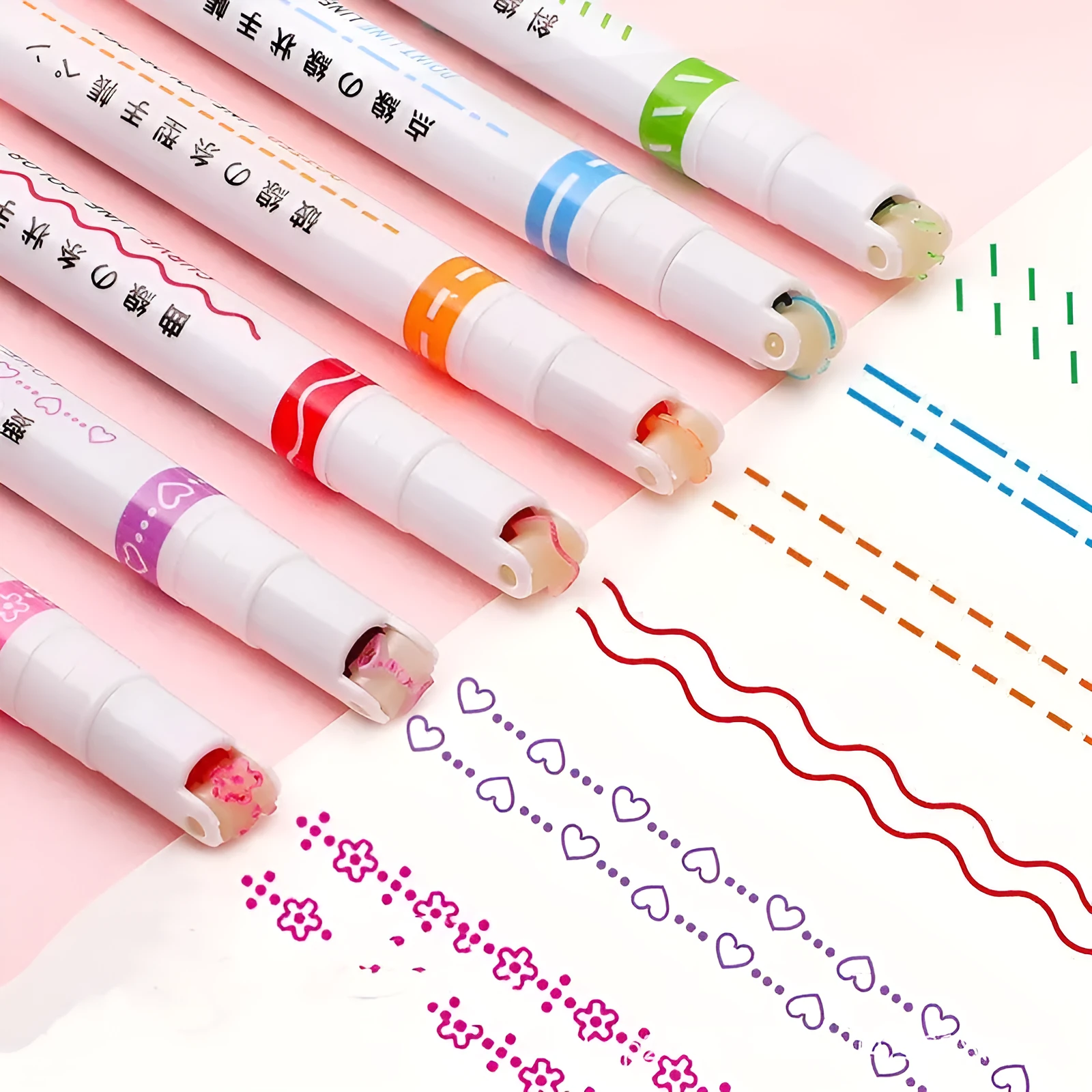 Plastic case containing a set of creative curve roller pens for outline drawing and journaling.