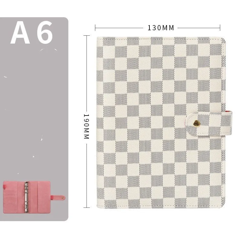 Red checkered imitation leather loose-leaf notebook in A5 size, showing the binding mechanism.