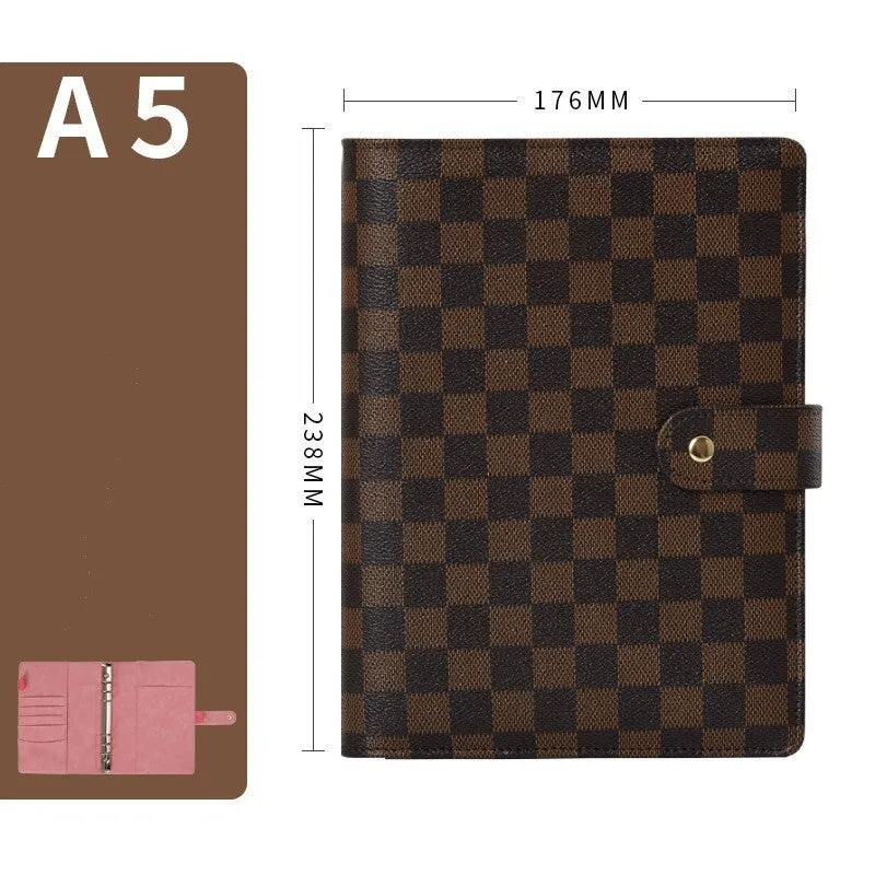 Red checkered imitation leather loose-leaf notebook in A5 size, showing the binding mechanism.