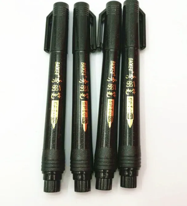 Set of four Japanese calligraphy brush pens and refills for ink drawing and sumi-e painting.