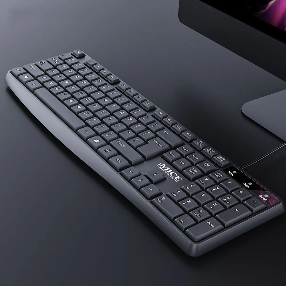 Black KM-520 wired keyboard and mouse set showing 104-key keyboard and optical mouse with USB cables