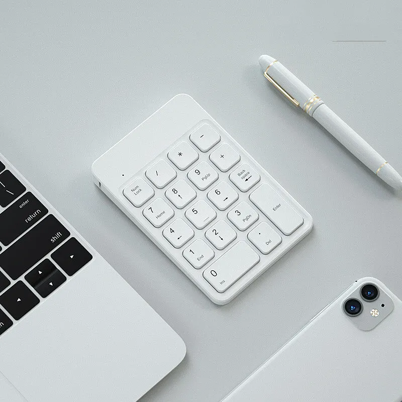 Wireless Bluetooth keyboard and mouse set for Apple devices in cherry blossom pink, white, and black