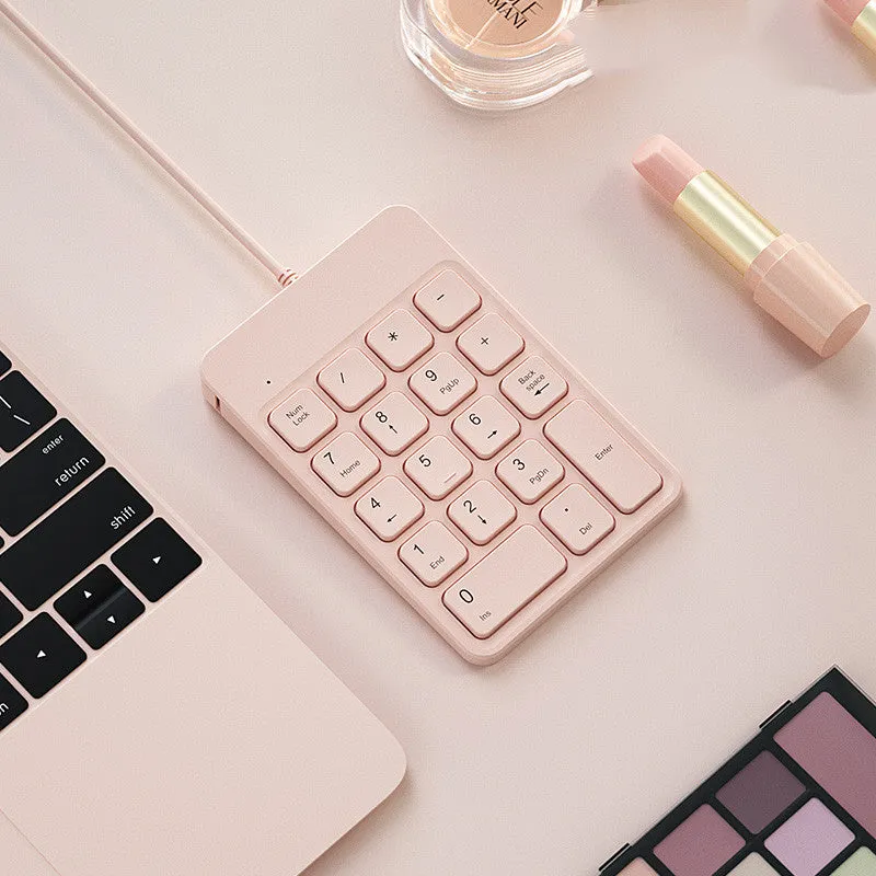 Wireless Bluetooth keyboard and mouse set for Apple devices in cherry blossom pink, white, and black