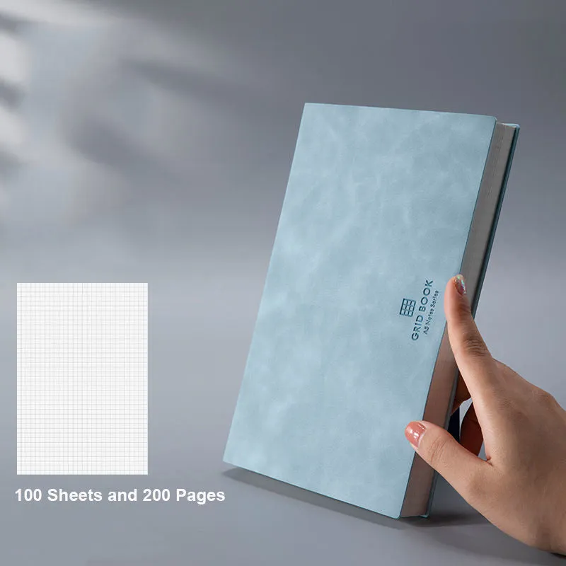 Grid book with hand-painted square grid, PU cover in lake blue, locking plastic binding, A5 size