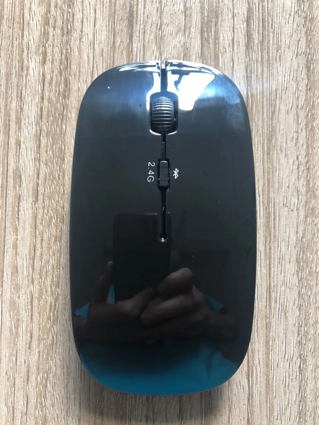 Wireless Bluetooth dual mode slim mouse with 1200 DPI sensor and four way roller in black side view