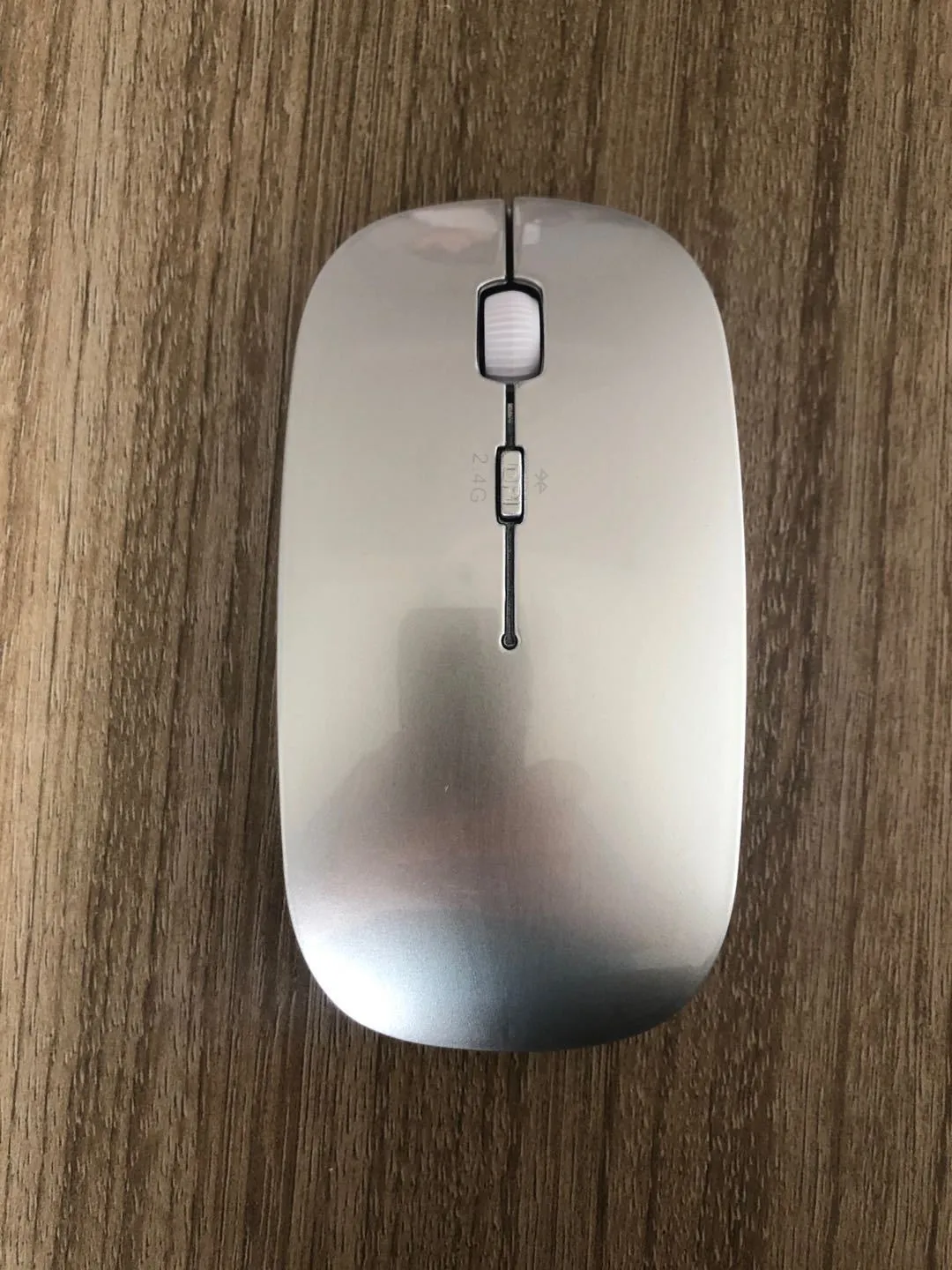 Wireless Bluetooth dual mode slim mouse with 1200 DPI sensor and four way roller in black side view