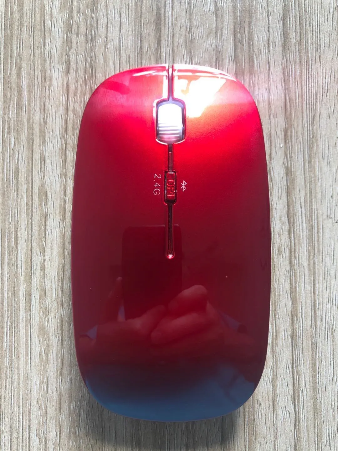 Wireless Bluetooth dual mode slim mouse with 1200 DPI sensor and four way roller in black side view