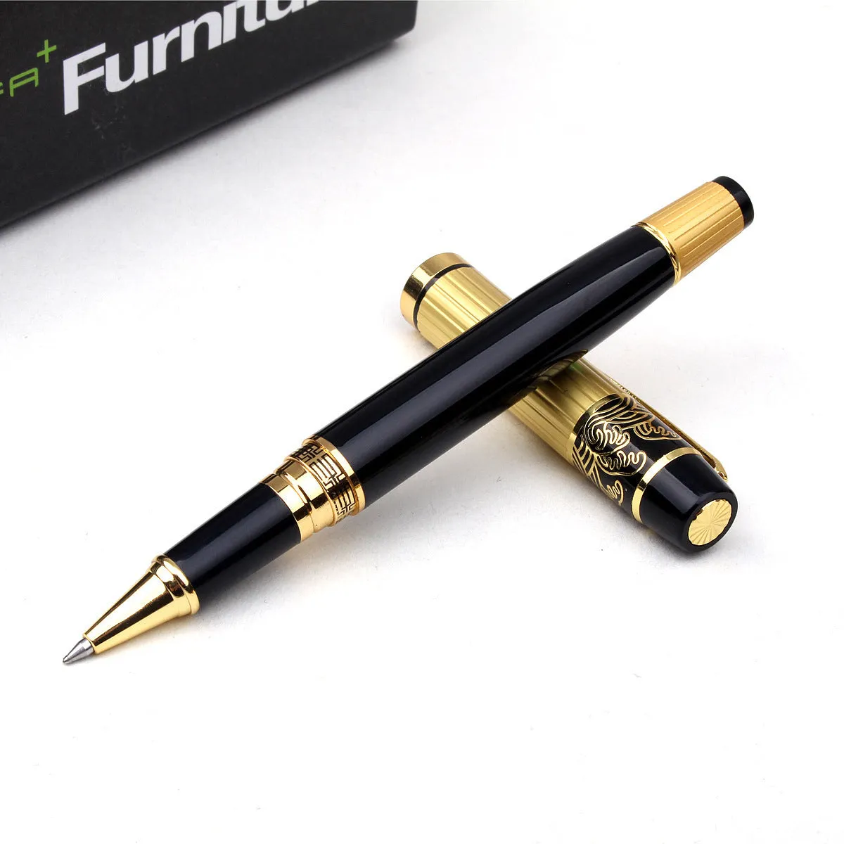 Metal ballpoint pen with hollow pattern design, black ink, 0.5mm writing point, isolated on white background