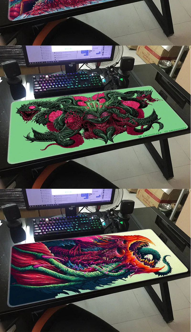 Custom rubber mouse pad with non-slip base, cloth top, and wrist guard in multiple sizes for gaming use