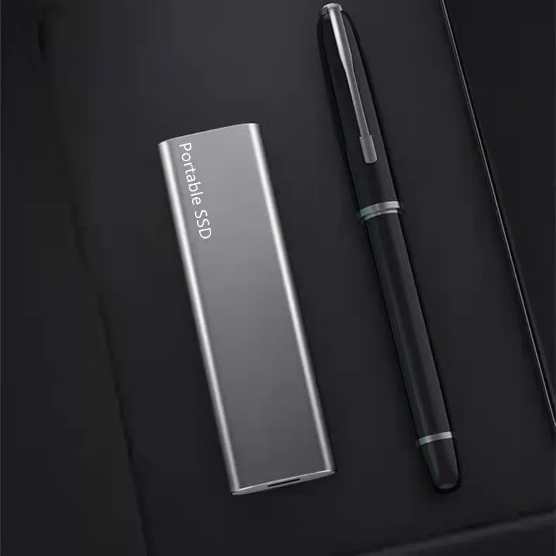 Ultra-thin external mobile solid-state drive with a metal shell, showing red interface connector.