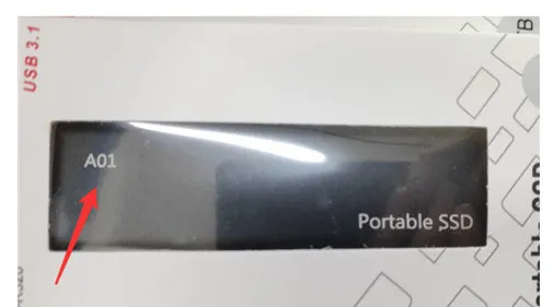 Ultra-thin external mobile solid-state drive with a metal shell, showing red interface connector.
