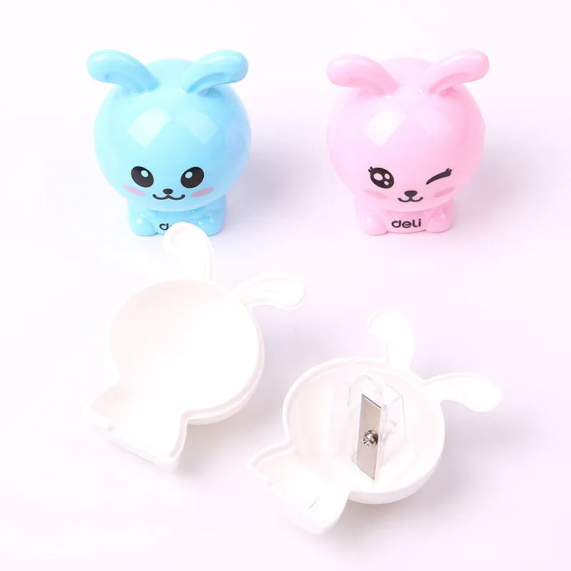 Mini cartoon pencil sharpener with random bunny design for children, plastic and metal construction
