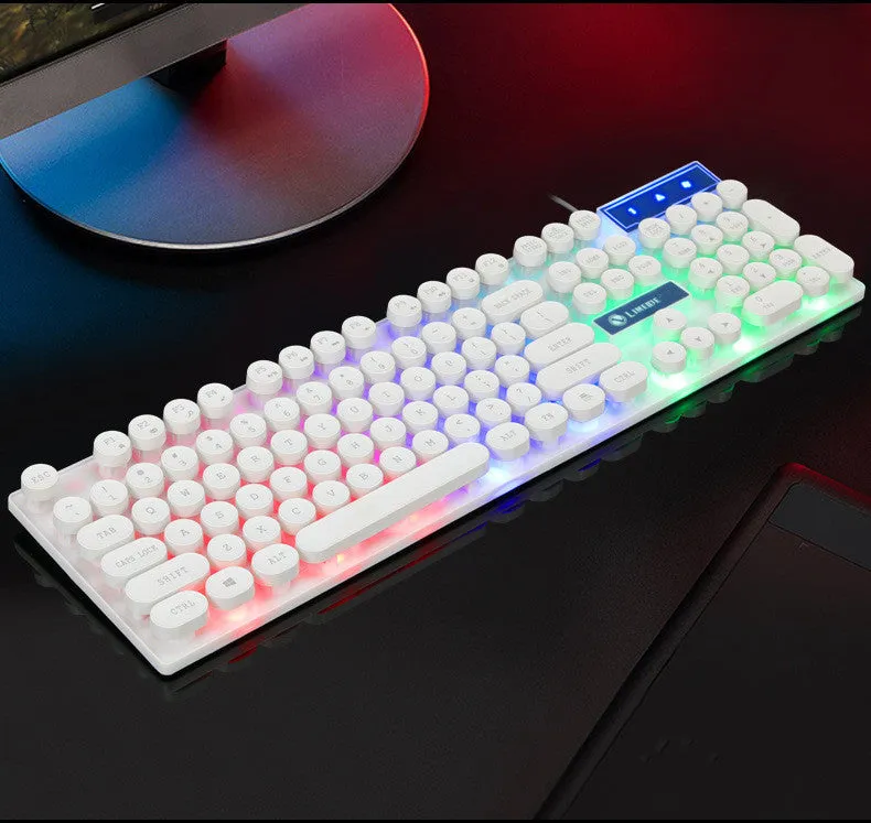 Limei Tx30 retro punk keyboard with rainbow backlight and round key caps, black colour, on a desk