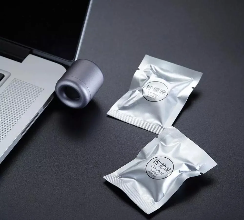 USB mini diffuser car air purifier in grey colour, portable solid device for fresh air