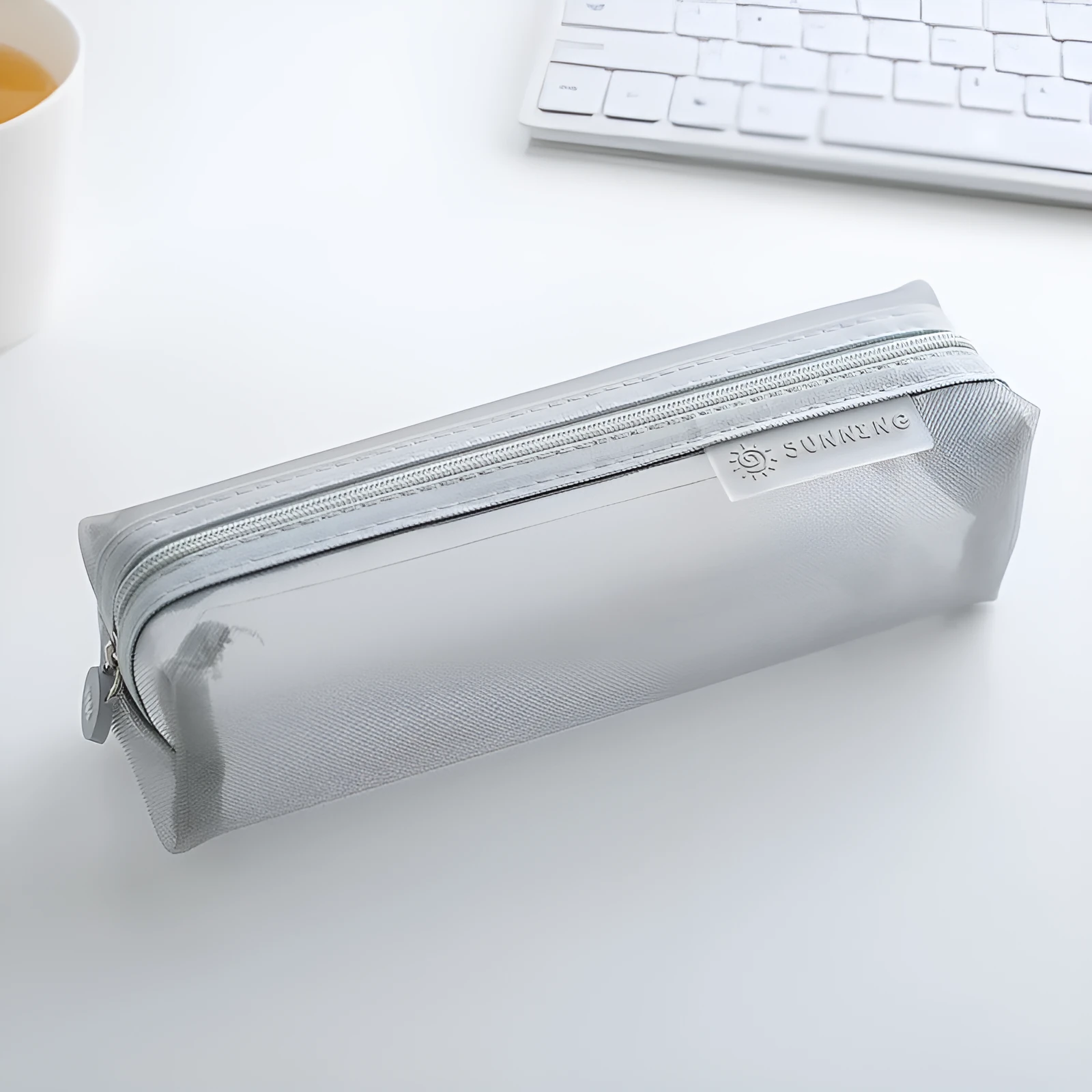 Transparent nylon mesh pencil case in square shape with smooth zipper, measuring 20.5x6x6.5cm