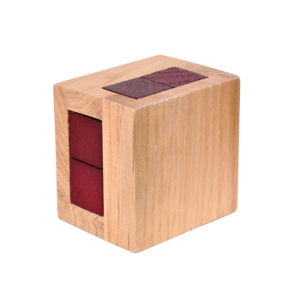 Wooden Kongming lock puzzle in Colour A, 7x7x5.5cm, on a table