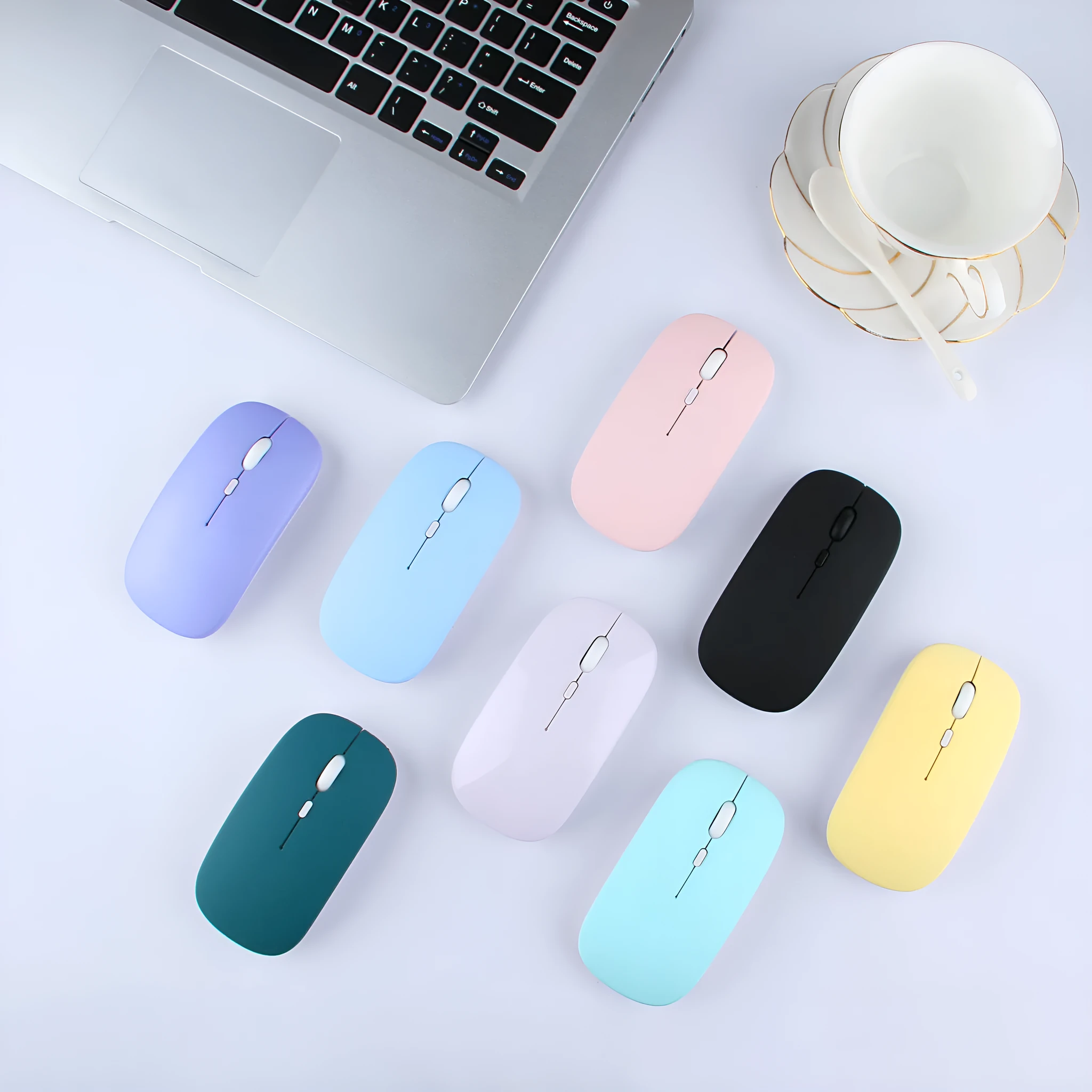 Candy wireless Bluetooth mouse in pink, ergonomic shape, 1200dpi, silent buttons, on a white desk