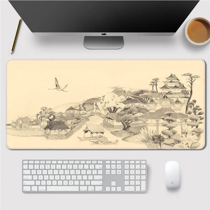 Landscape mouse mat with rubber base and cloth surface on a desk, showing heat transfer printed image