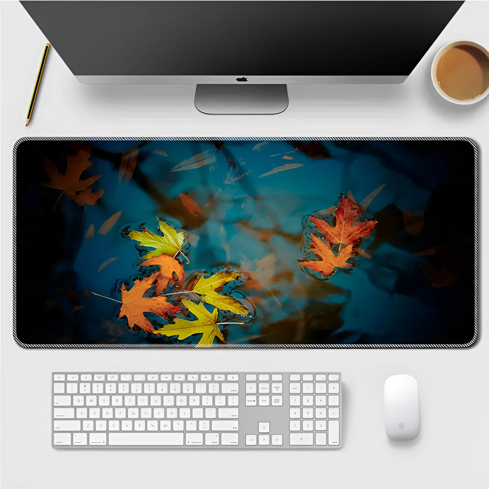 Landscape mouse mat with rubber base and cloth surface on a desk, showing heat transfer printed image