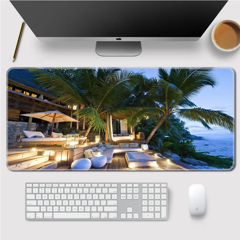Landscape mouse mat with rubber base and cloth surface on a desk, showing heat transfer printed image
