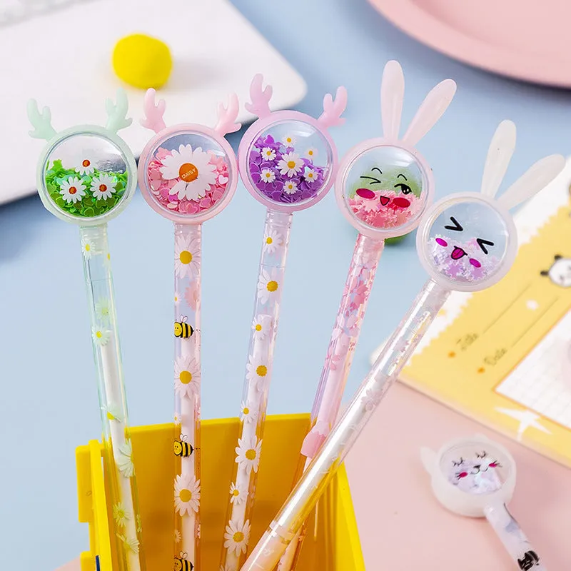 Cute tutu sequin gel pen with black ink and 0.5mm tip on a wooden desk