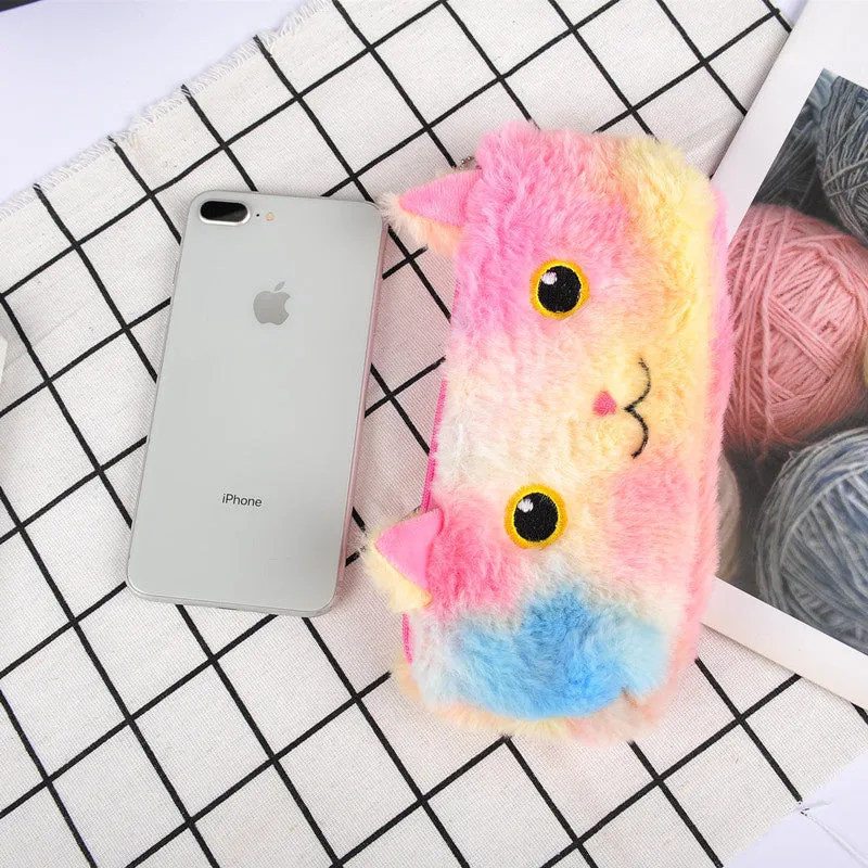 Laser colour plush pencil case with cartoon squinting face design, 21x9cm, on a plain background