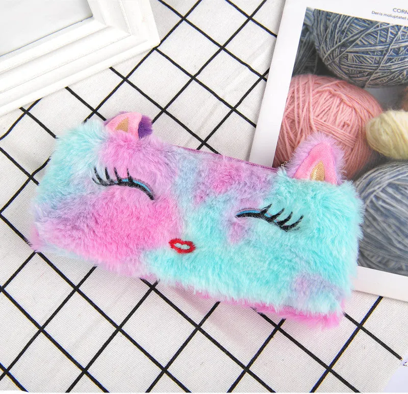 Laser colour plush pencil case with cartoon squinting face design, 21x9cm, on a plain background
