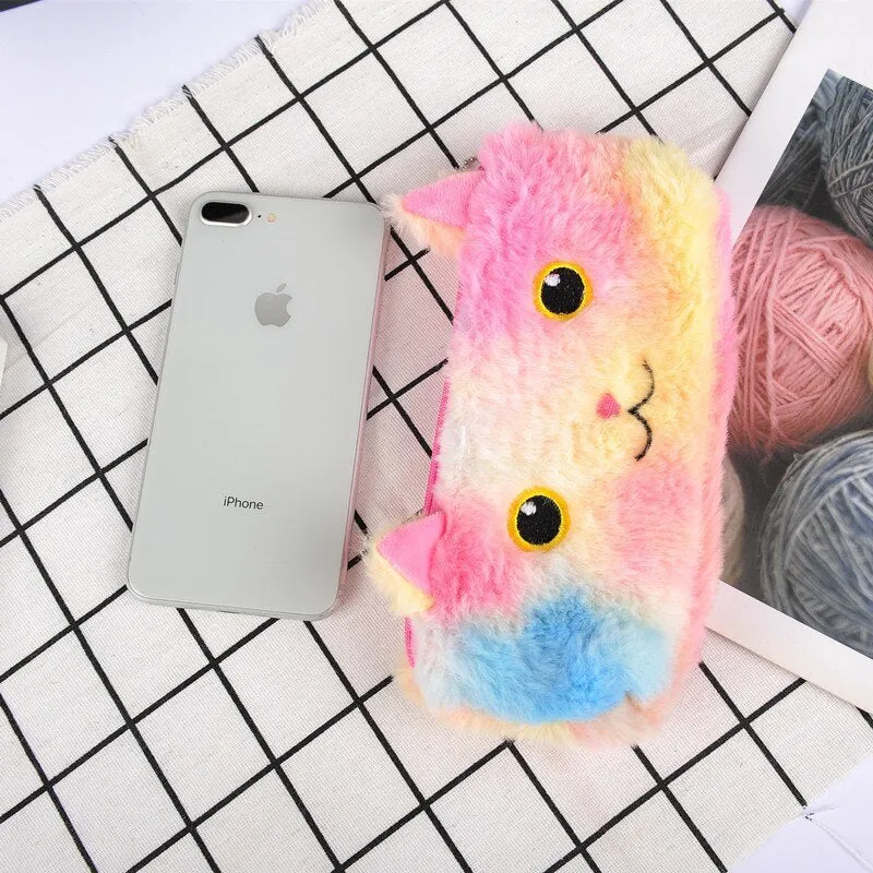 Laser colour plush pencil case with cartoon squinting face design, 21x9cm, on a plain background