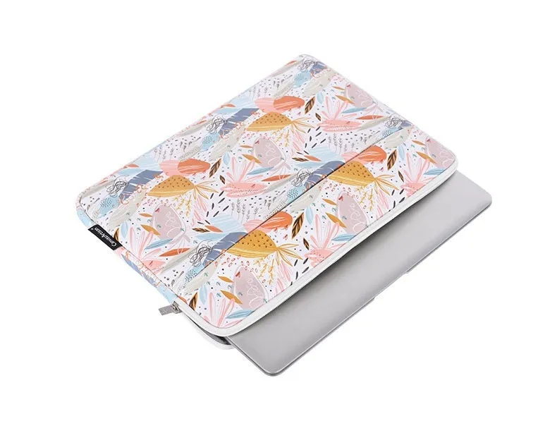 White waterproof PU leather laptop inner sleeve for a 14-inch computer on a table.