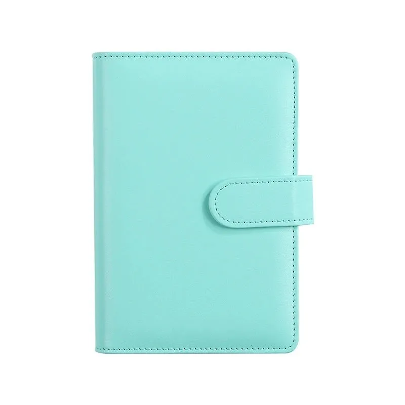 Solid colour A5 PU leather zippered loose-leaf binder notebook shell on a desk