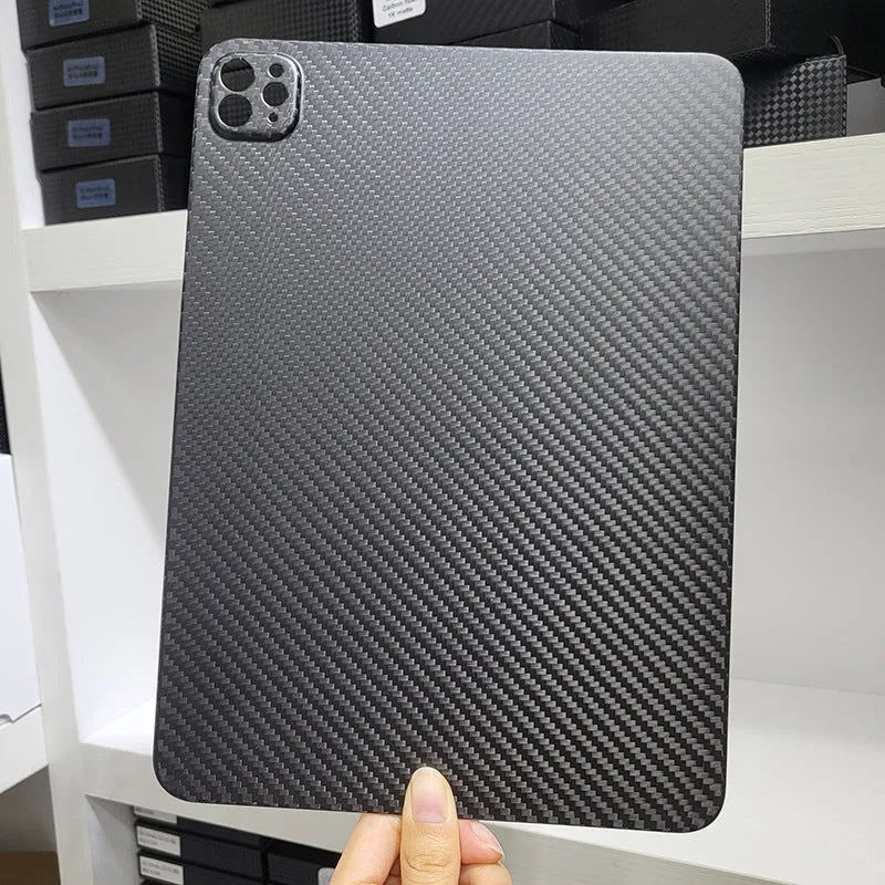 Flat carbon fibre hard protective case for Apple iPad Pro 11 tablet in a textured finish.