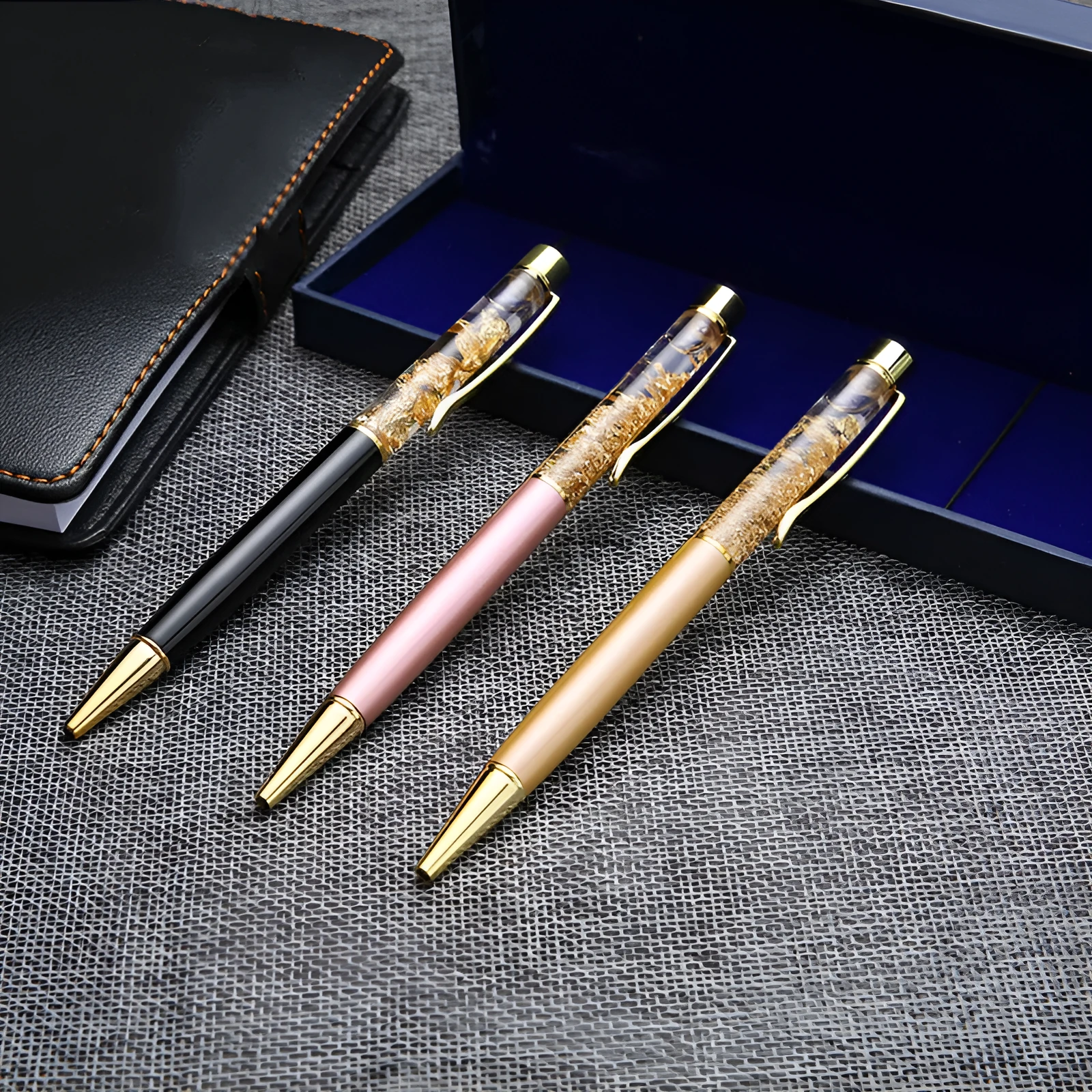 Gold foil metal ballpoint pen with 1mm tip, 13.8cm long, in gold colour