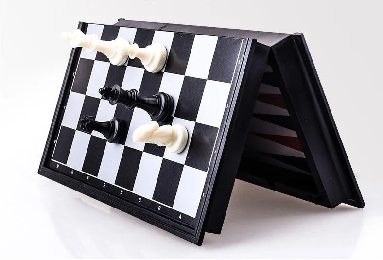 Three-in-one magnetic chess checkers backgammon board game with plastic board and ABS pieces on a table