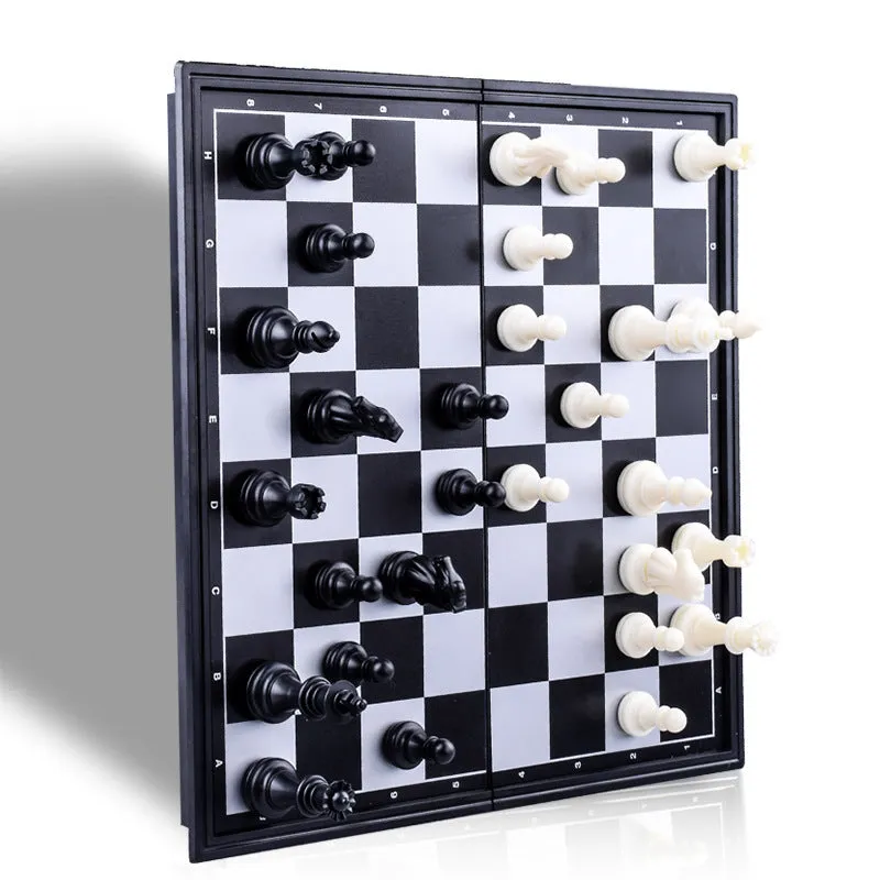 Three-in-one magnetic chess checkers backgammon board game with plastic board and ABS pieces on a table