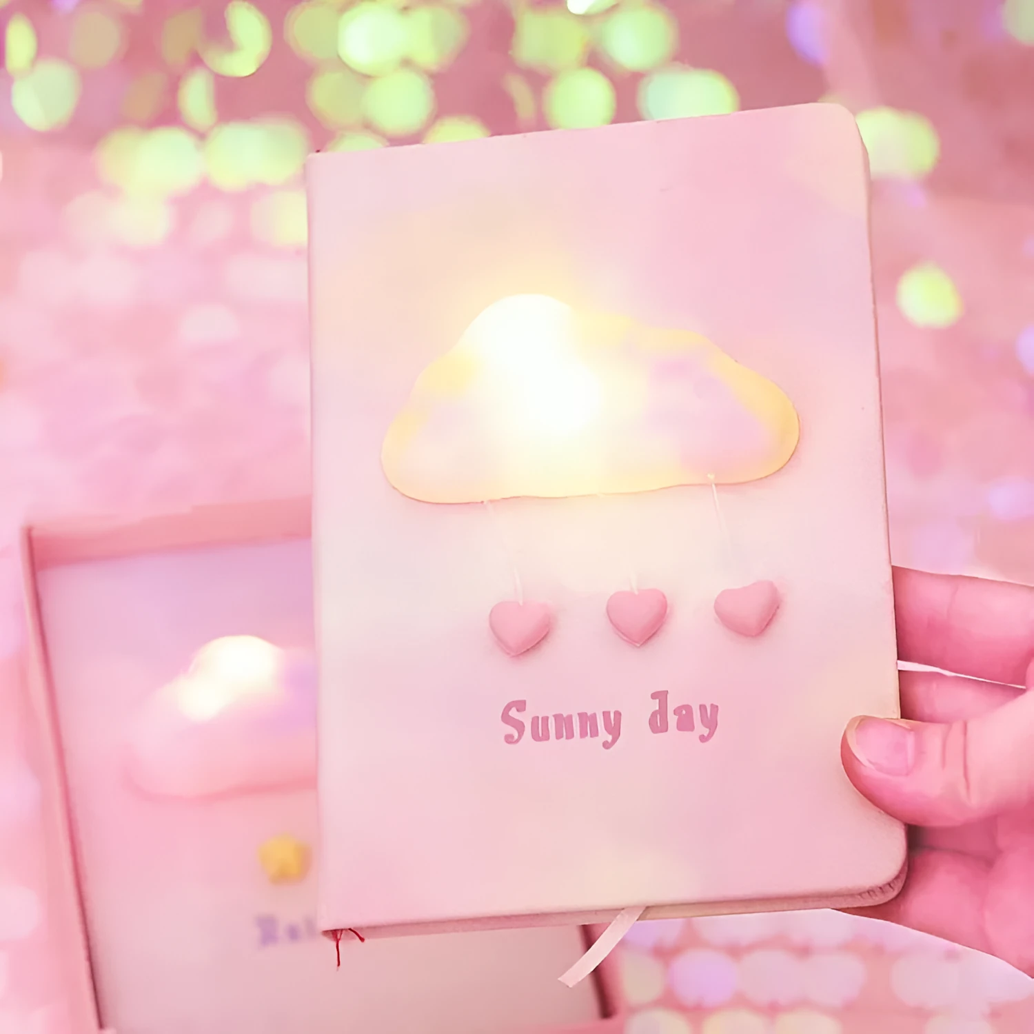 Cloud Bubble Light Notebook with imitation leather cover, wireless binding, and 12x17 cm paper pages in Love or Star colour