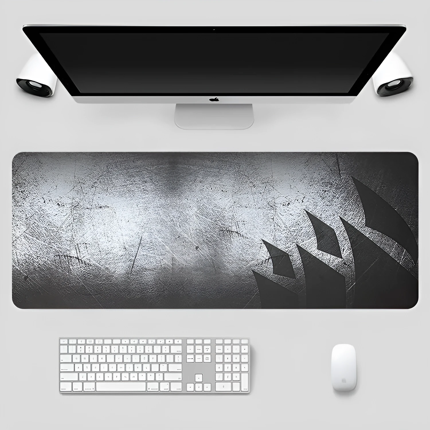 Black thickened non-slip mouse pad with rubber base and cloth surface on a desk