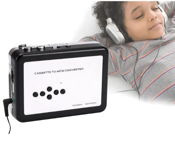 White USB Cassette to MP3 Converter with earphone and USB cable on desk