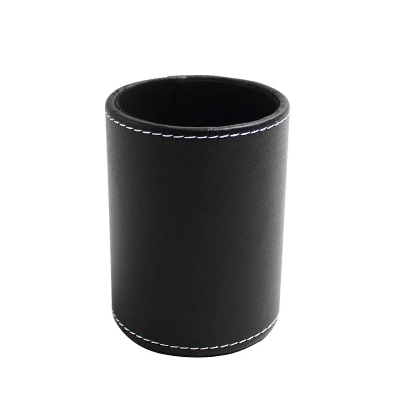 Black leather cylindrical pen holder measuring 8cm wide × 10.8cm tall on desk