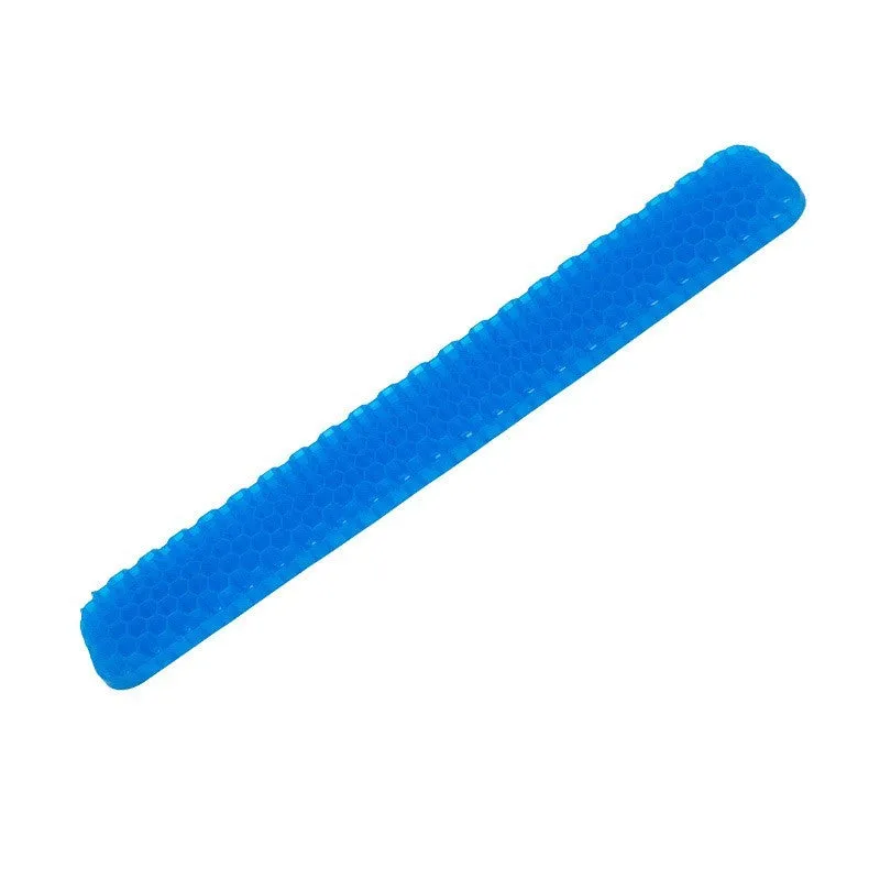 Polymer double-sided wrist rest in blue with hollow grid pattern for keyboard and mouse support