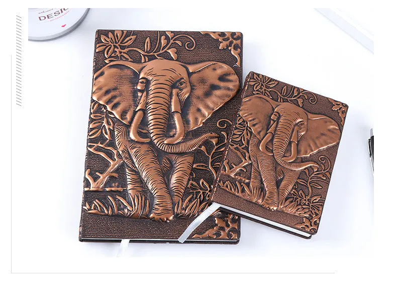 Hardcover PU leather notebook with embossed retro cover and brushed bronze details, open at 180 degrees showing beige pages