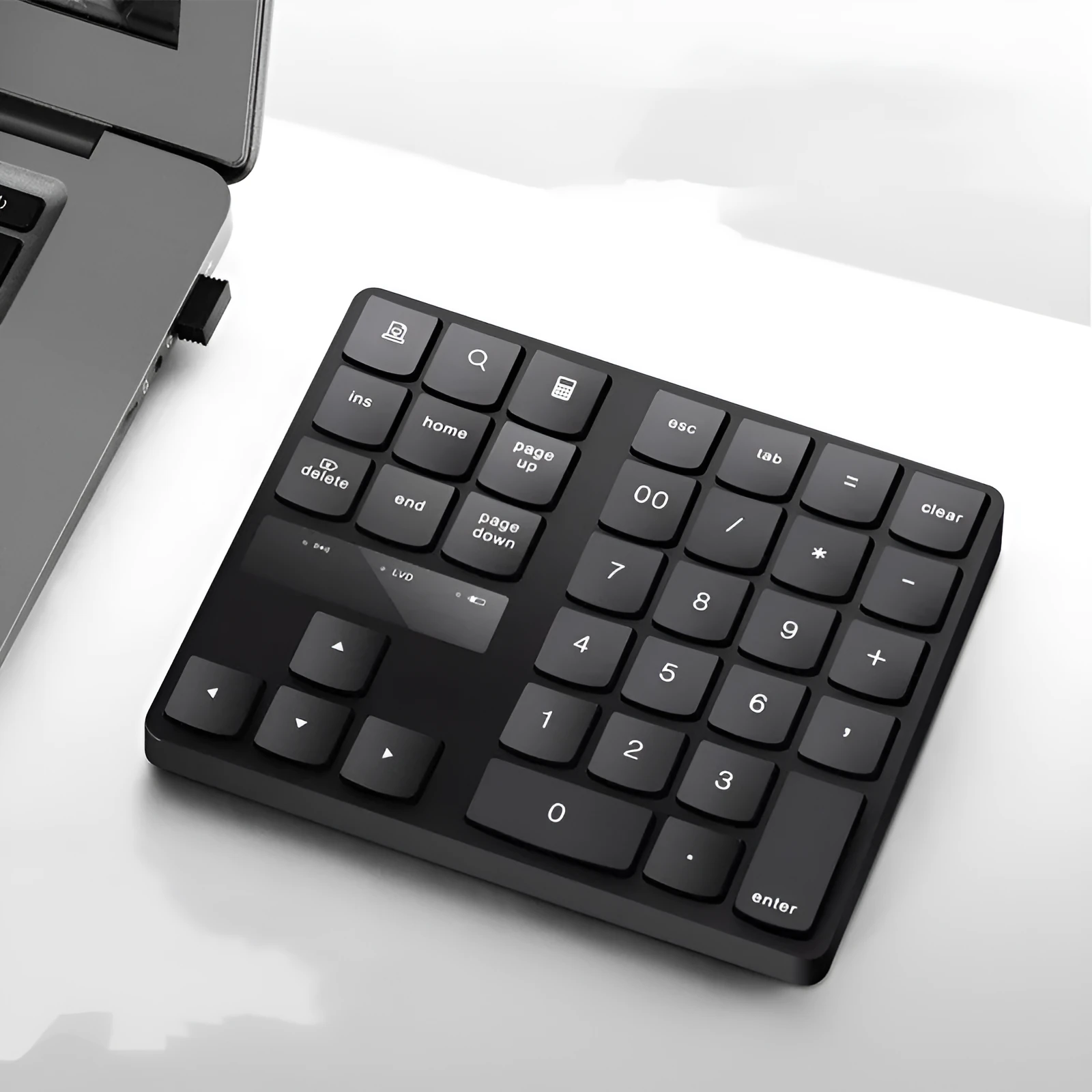 Black wireless numeric keyboard with 35 keys, ABS construction, 145x120x19mm dimensions, USB charging cable and receiver visible