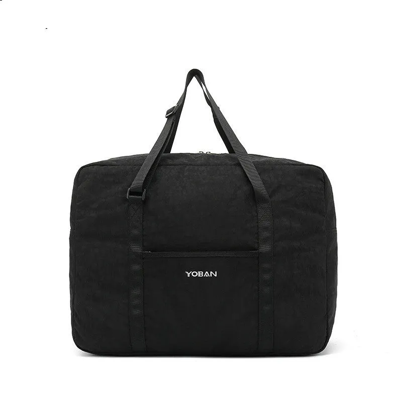 Large waterproof foldable travel bag in black with 20-35L capacity and zipper closure