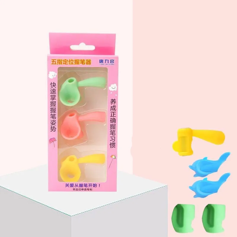 Children's pencil grip orthosis pen holder in assorted colours for learning correct writing posture.
