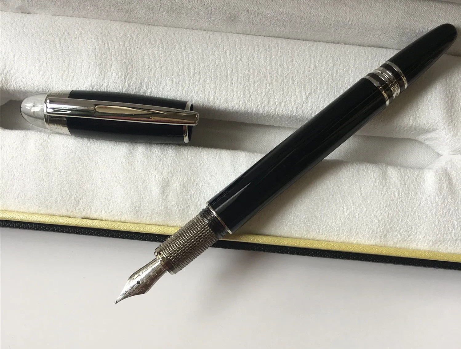 Interstellar Crystal Head series metal rollerball pen in black, with resin metal barrel and black ink refill