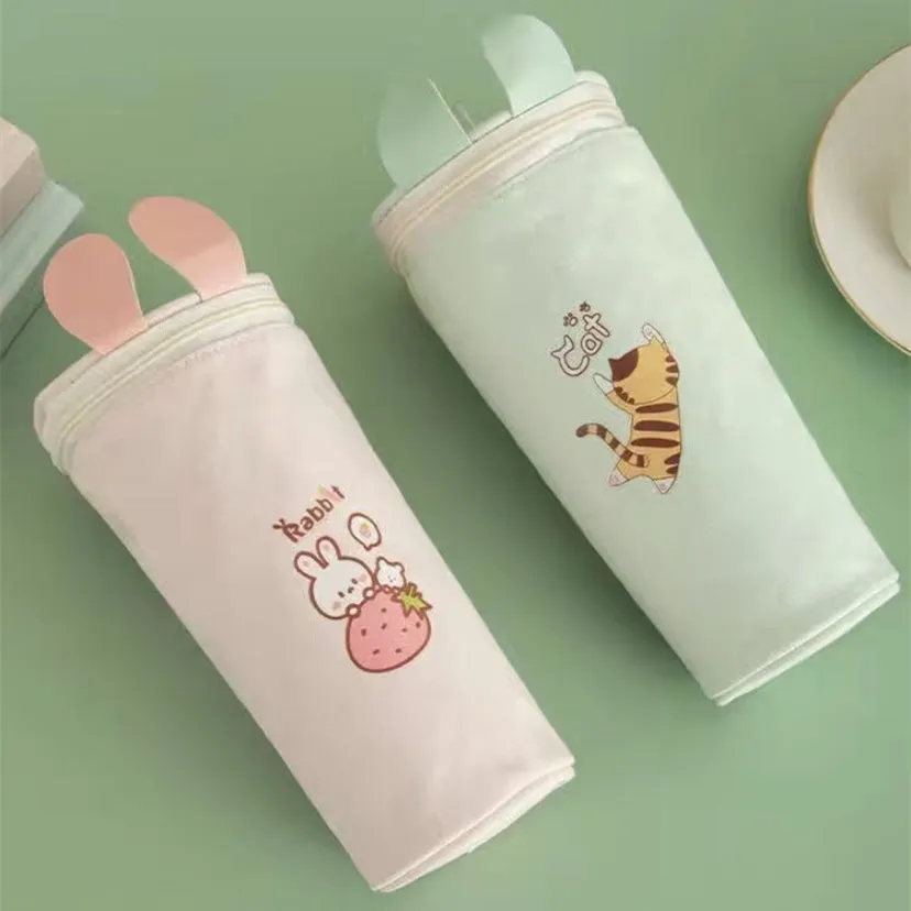 Round canvas pencil case in random colour with cartoon pattern, 193x72mm, for children's school stationery