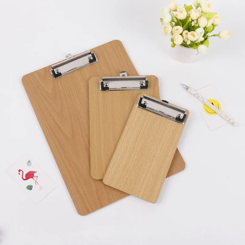 A4 hard wooden clipboard with metal clip and hanging hole, 22.5 by 31.5 cm, natural wood colour